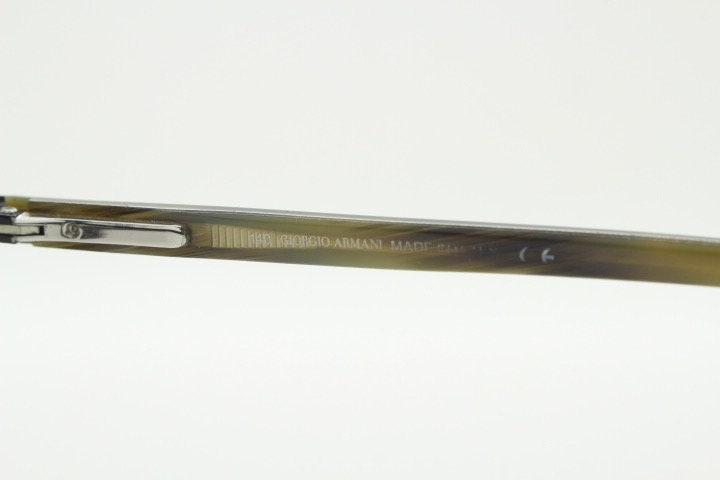 Giorgio Armani rectangular eye glasses model A268 made in Italy. Gunmetal grey half frame with acetate arms. Prescription optical eyeglasses