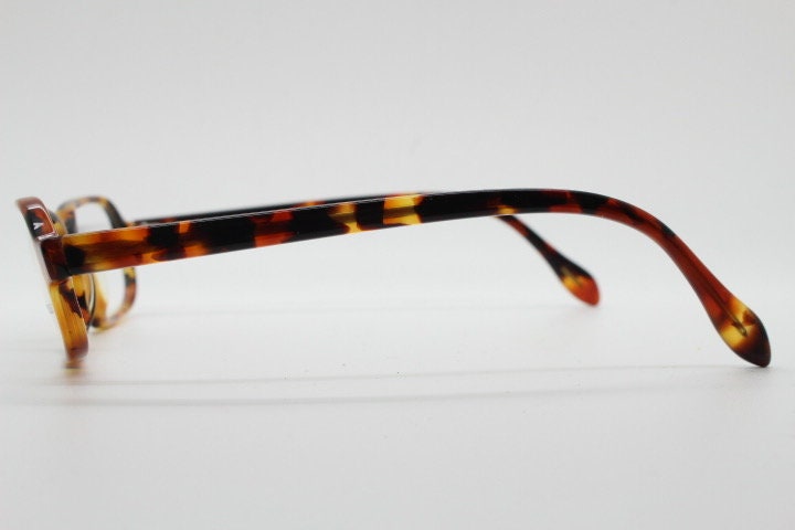 Alain Mikli par Mikli Paris rectangular eye glasses hand made in France. Amber tortoise optical frame. Womens prescription eyeglasses. NOS