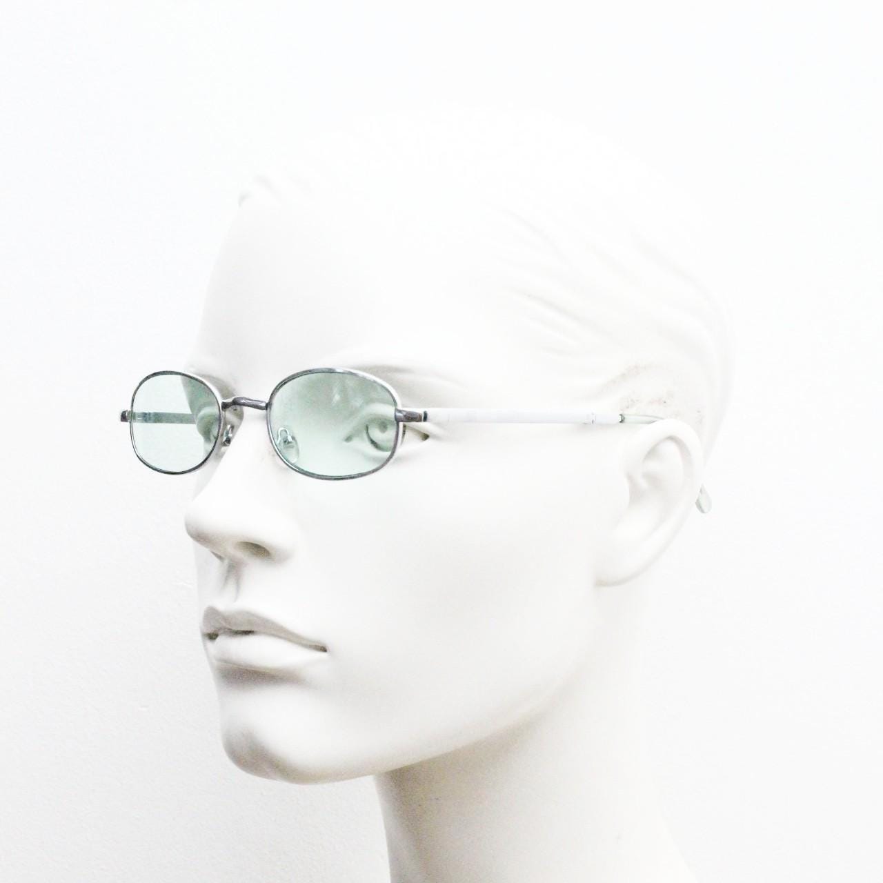90s micro foldable oval sunglasses. Light green lenses in a small silver folding compact frame. Folder. Rave 2000s. Y2K. NOS