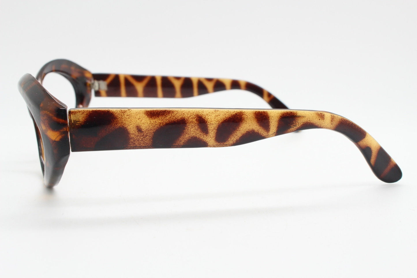80s vintage oval cat eye glasses. Crop sided dynamic tortoise cateye optical frames. 60s style prescription eyeglasses. RX spectacles. NOS
