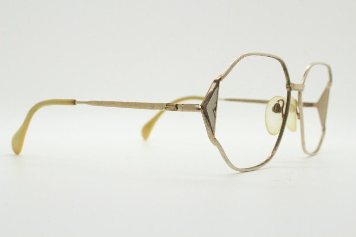Silhouette 70s vintage octagon eye glasses. Womens sophisticated angular golden optical frame with white detail. Prescription eyeglasses. Rx