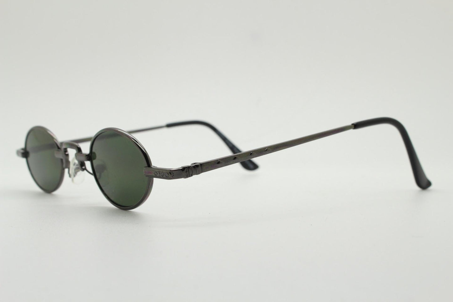 90s vintage small oval sunglasses. Imposing minimal grey metal victorian style frame with green lenses. Steampunk. Micro. Unused NOS