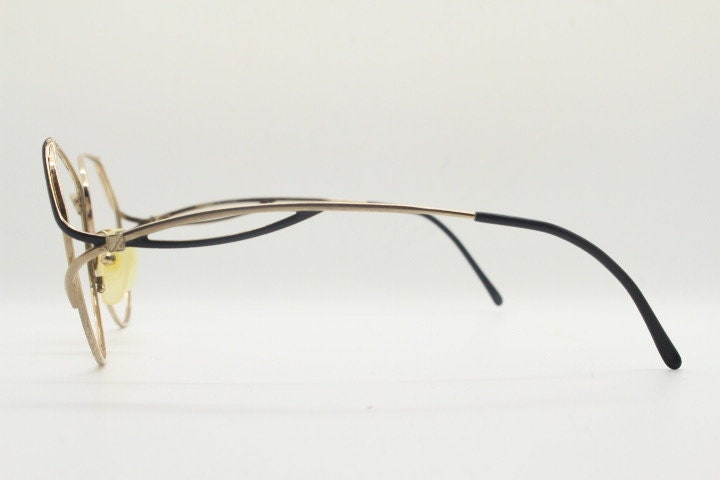 Viennaline 70s vintage angular round eye glasses. Slightly oversized subtle gold chrome optical frame with incredible arms. Prescription RX