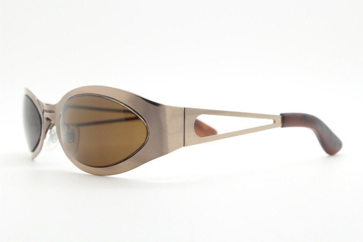 2000s vintage wraparound angular sunglasses. Brown chrome flat curved metal frame with cut out arms. 90s. Y2K unused NOS