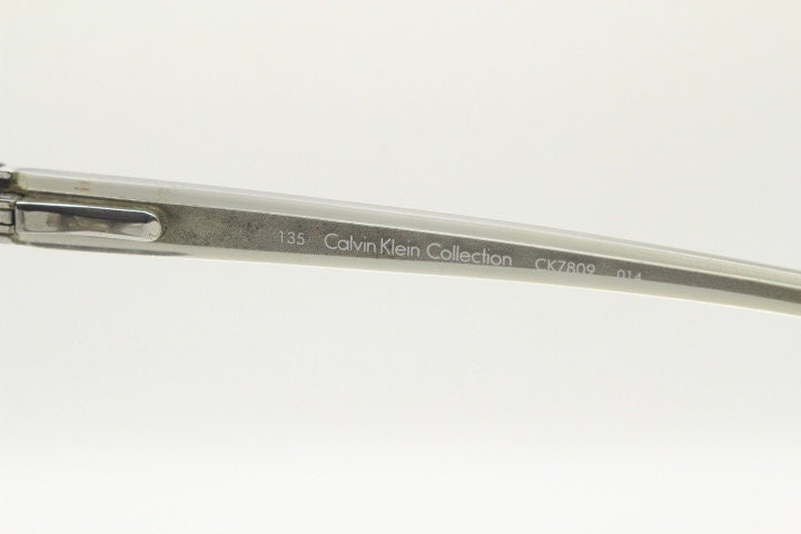Calvin Klein collection rectangular eye glasses. Marbled grey crystal ombre acetate optical frames. Prescription eyeglasses. RX spectacles
