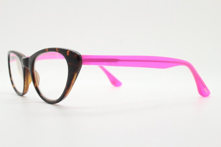 Isaac Mizrahi vintage cat eye glasses. Womens dark tortoise cateye optical frames with pink arms. Prescription eyeglasses. RX NOS spectacles