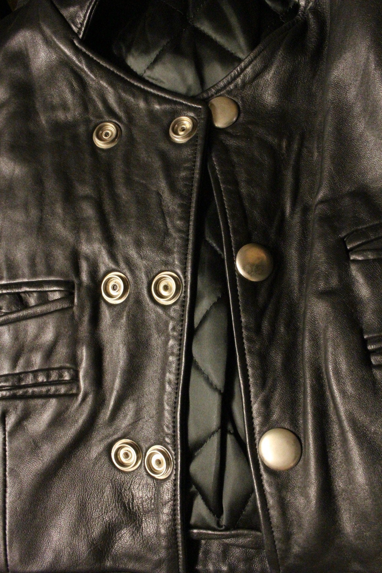 Hi-Tech 90s vintage black leather jacket. Made in England. Cropped oversized blouson design. Double breasted with chrome metal