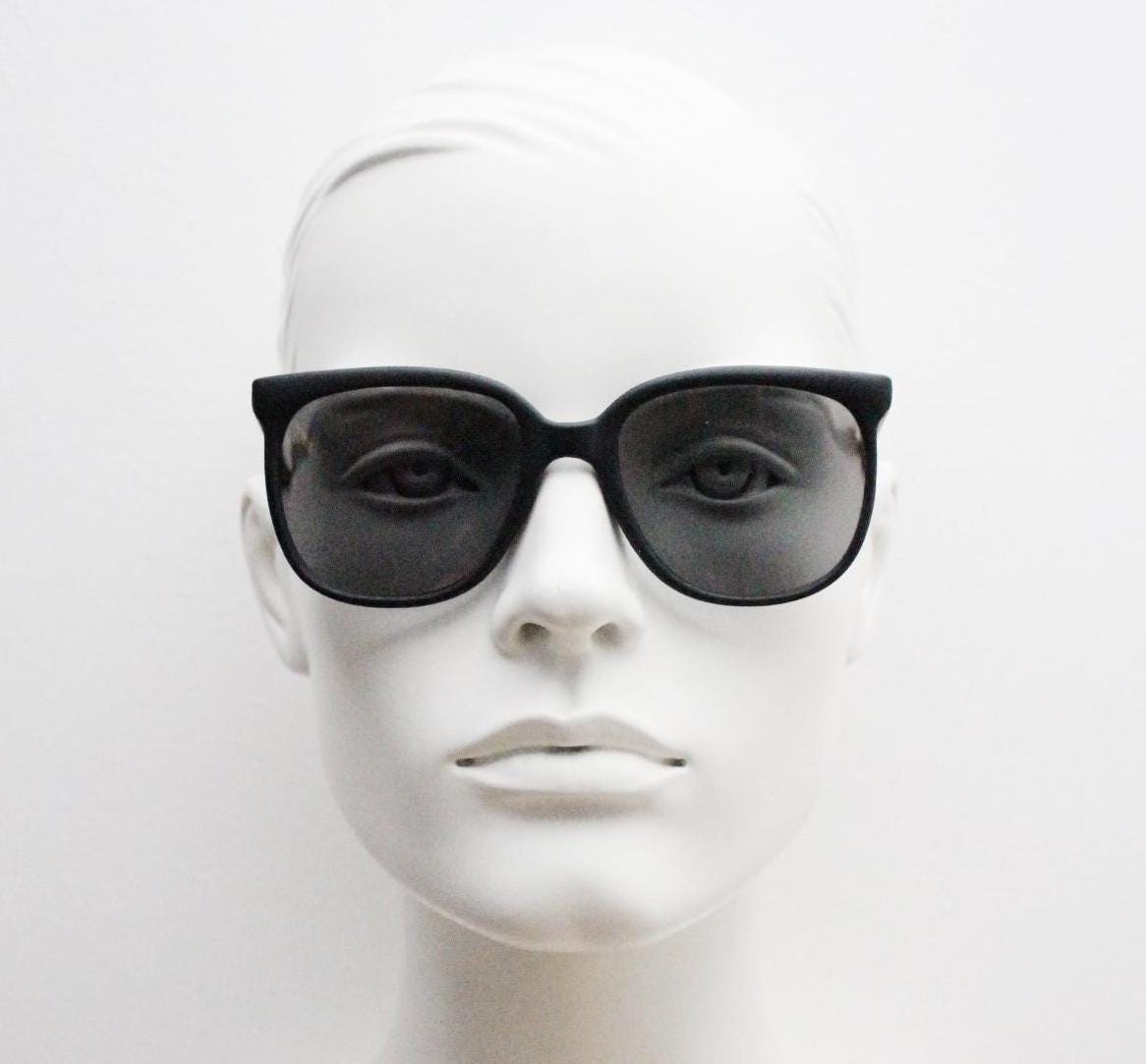 80s vintage flexible square sunglasses. Plain matt black frame with slight gold mirror glaze lens tone. Unused NOS. Rave