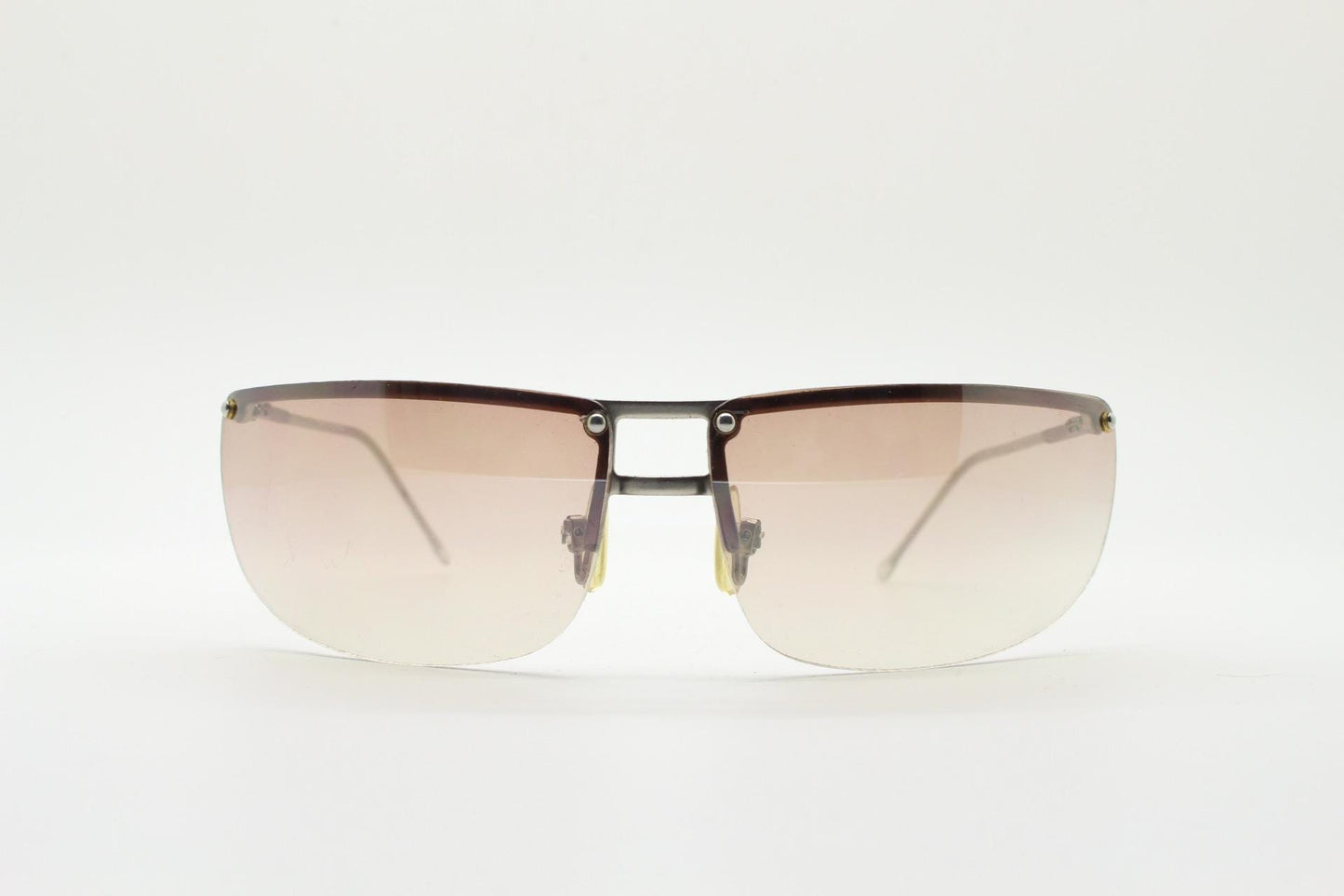 Y2K vintage visor sunglasses. Flat top half frame wraparound shield design with light tone graduating curved lenses. 2000's. NOS