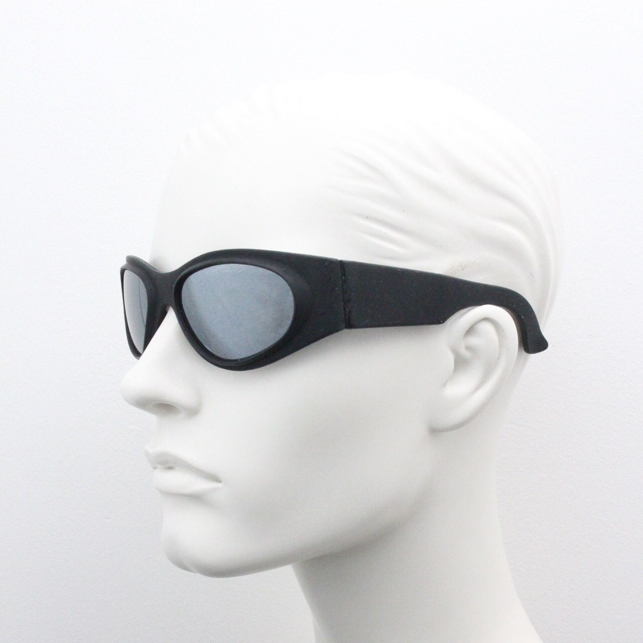 90s vintage futuristic super hero bug eye goggle sunglasses. Black rubber wrap around sporty shield frame with mirror lens. 2000s. Y2K. NOS