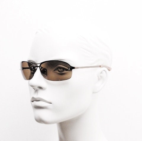 Y2K vintage oval aviator sunglasses. Metallic brown chrome half frame with mid tone curved bug eye lenses and straight arms. 2000's. NOS