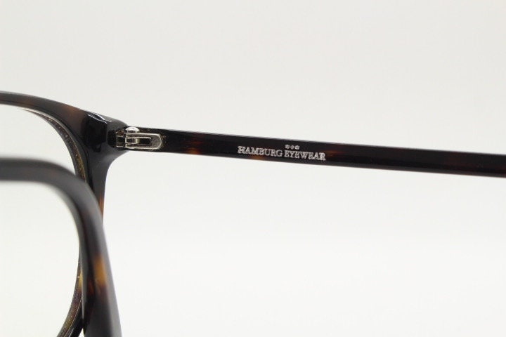 Hamburg eyewear round cat eye glasses made in Germany. Tortoise cateye acetate optical frame with keyhole bridge. Prescription eyeglasses RX
