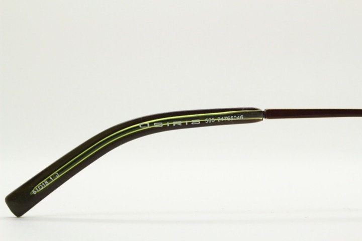 Osiris 90s vintage rectangular half rim eye glasses. Low profile optical frame in handsome brown chrome. Prescription RX Spectacles