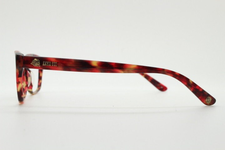 Anna Sui modified wayfarer design eye glasses. Superb marbled acetate optical frames with red tones. Prescription RX vintage eyeglasses