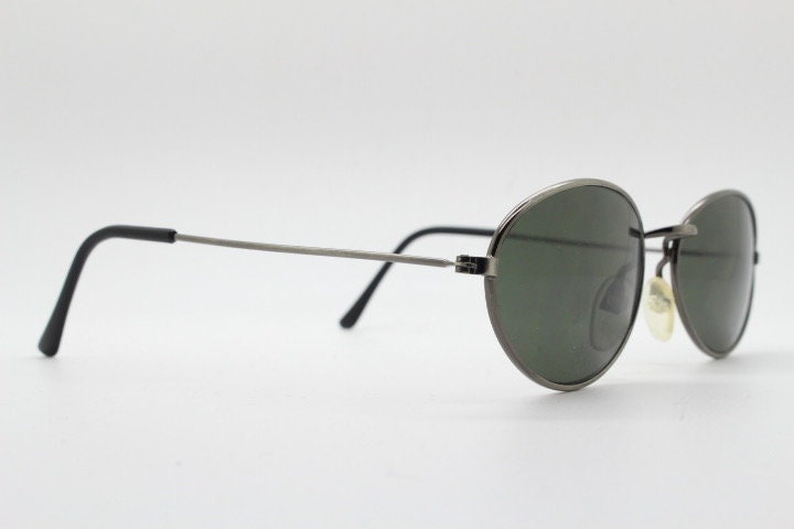 90s vintage metal oval sunglasses. Minimal brushed bronze finish brown frame with plain green lenses. Steampunk. Unused NOS