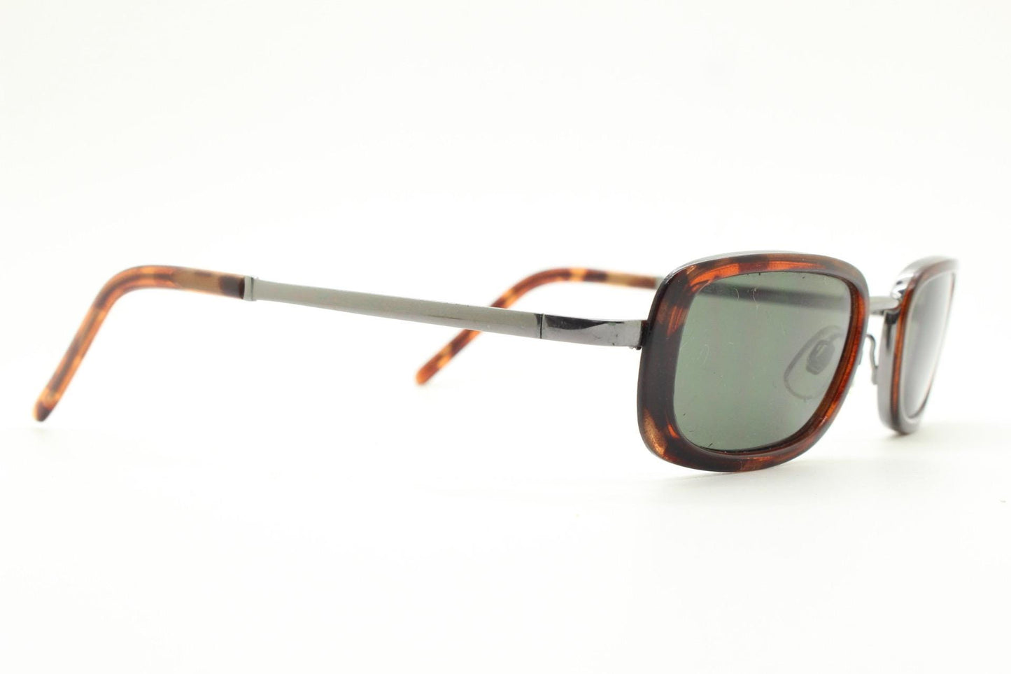 90s vintage rectangular sunglasses. Grey chrome metal frame with protruding tortoise insets, matching ear bends and green lenses