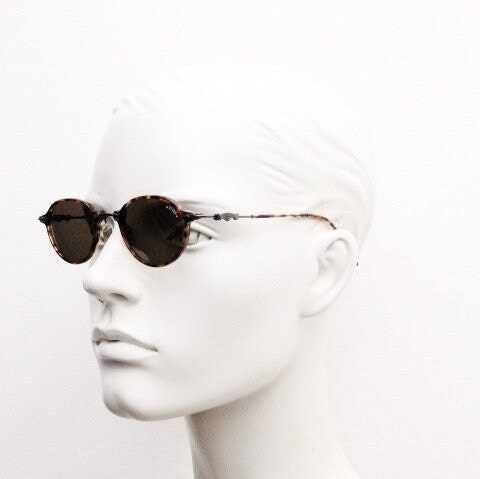 Sting 90s vintage oval sunglasses made in Italy. Refined 'industrial tech' fused with 1930s style in bronze metal and tortoise . Unused NOS