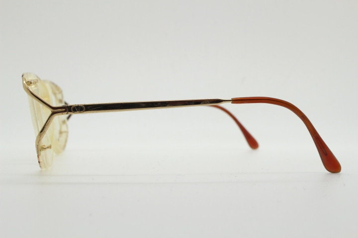 Valentino 90s vintage eye glasses made in Italy. Crystal and abstract pattern optical frames with golden forked arms. Prescription RX