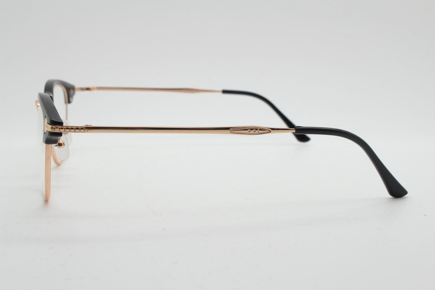 90s vintage browline cat eye glasses. Black gloss and gold half frame eyeglasses. 50s, 60s cateye design with clear lenses. NOS