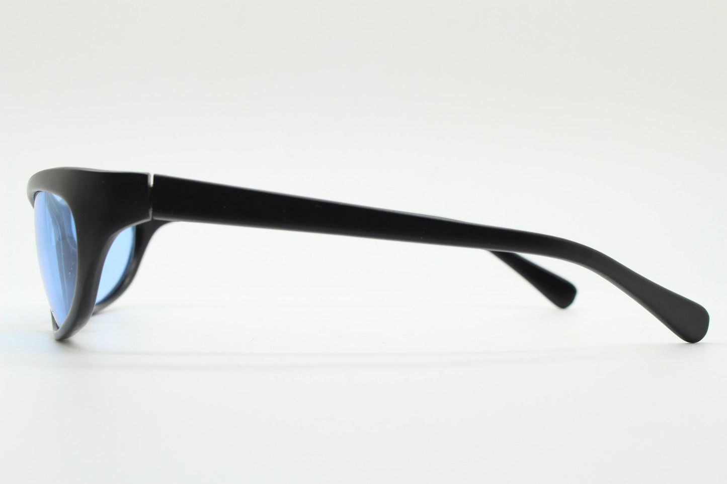 90s vintage curved wraparound sunglasses. Aerodynamic low profile black satin finish frame with light tone blue lenses. Sports shield. NOS