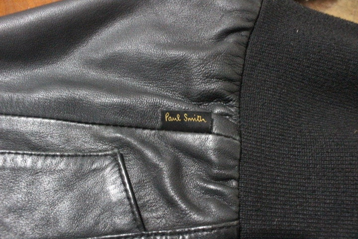 Paul Smith high collar bomber jacket. Plain black lambskin minimal flap pocket mens zipper. Ribbed collar. Size Medium