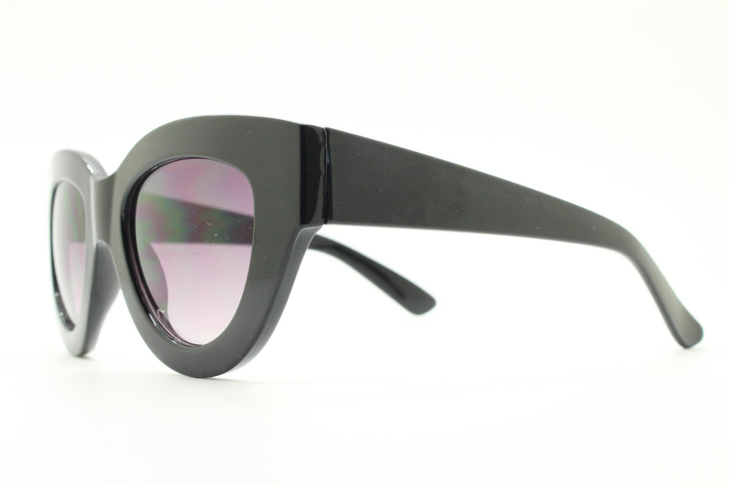 Y2K vintage thick oversized cateye sunglasses. Womens black gloss big arm cat eye frame with gradient lenses. 2000s NOS