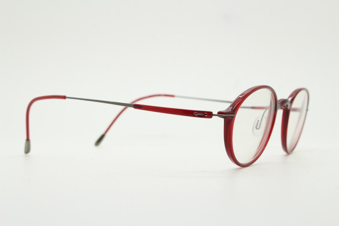 Silhouette rectangular frameless eye glasses made in Austria. Lightweight 1930s design with titanium. Red optical frame. Prescription RX