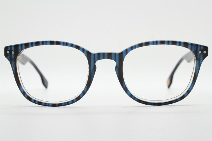 Boss Orange vintage wayfarer shape eye glasses. Black and navy striped optical frames with keyhole bridge. Prescription eyeglasses. RX Hugo