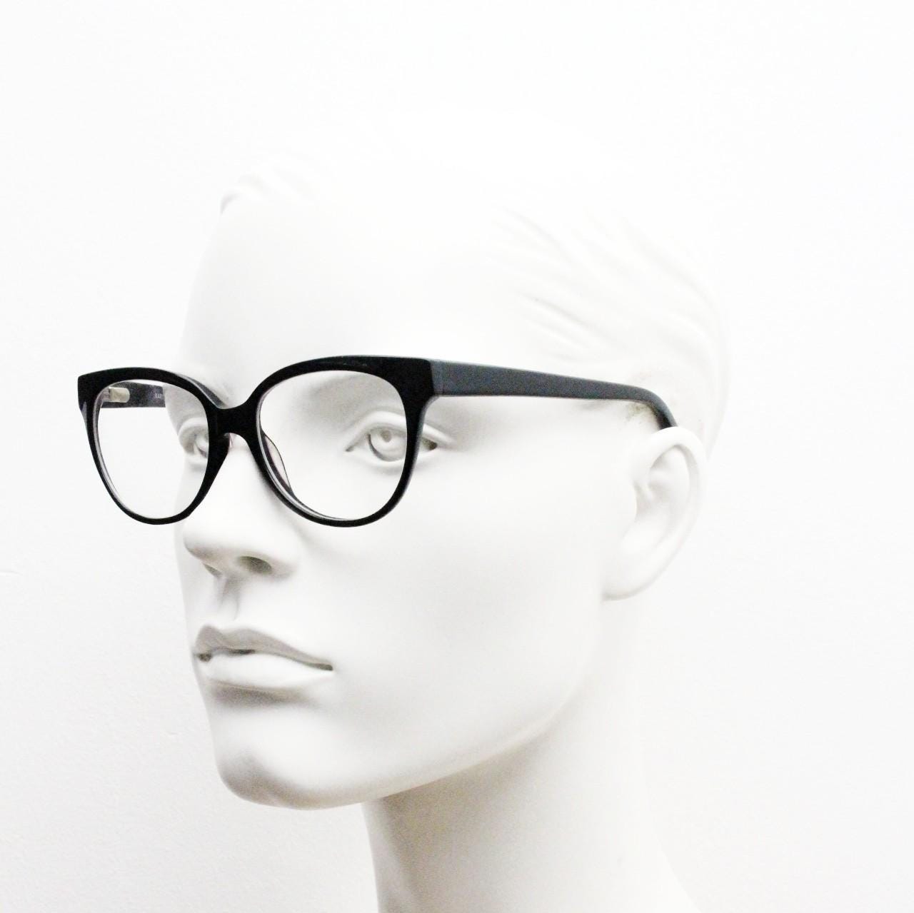 Modified cat eye glasses by Karian. Plain black gloss optical frames in high quality acetate. Prescription eyeglasses. RX cateye spectacles