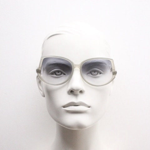 Silhouette 70s vintage abstract upside down sunglasses model 3018 made in Austria. Dynamic grey pearlised acetate frame with white stripes