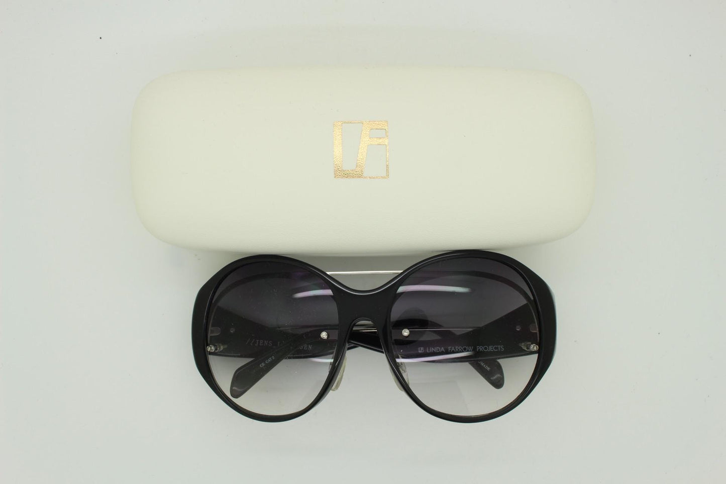 Jens Laugesen oversized sunglasses hand made by Linda Farrow. Black frame with undulating arms and smoky lenses. 70s design. Vintage. NOS