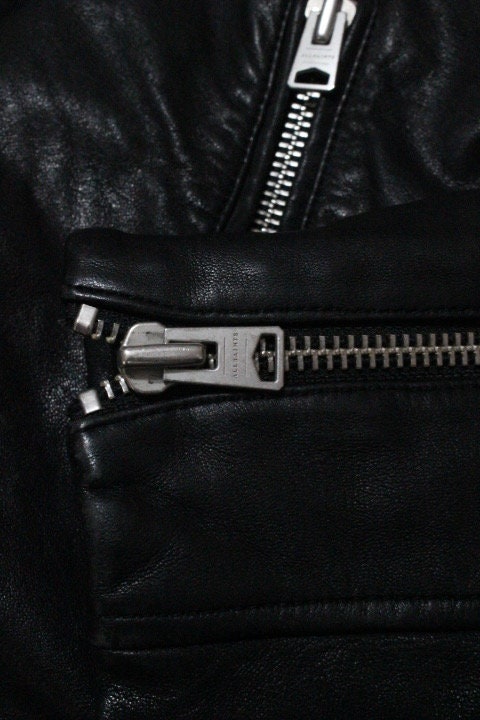 Allsaints black motorcycle jacket with. Genuine lambs leather hip length biker with fixed adjustable belt. BNWOT. Over 30% sale rrp 469 GBP