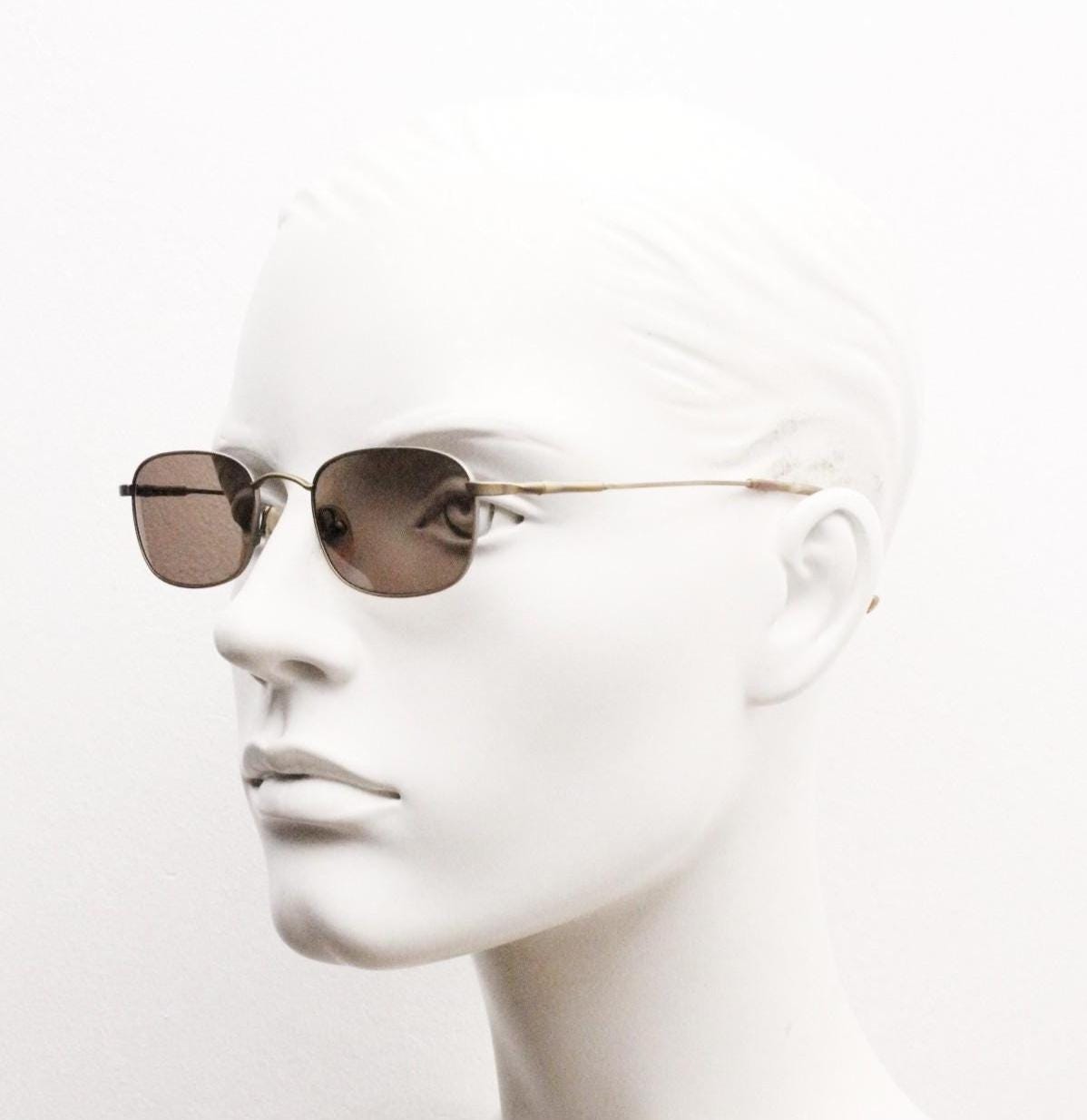 90s vintage small rectangular low profile metal sunglasses. Minimal slim frame in satin bronze finish with plain brown lenses. NOS. BNWT