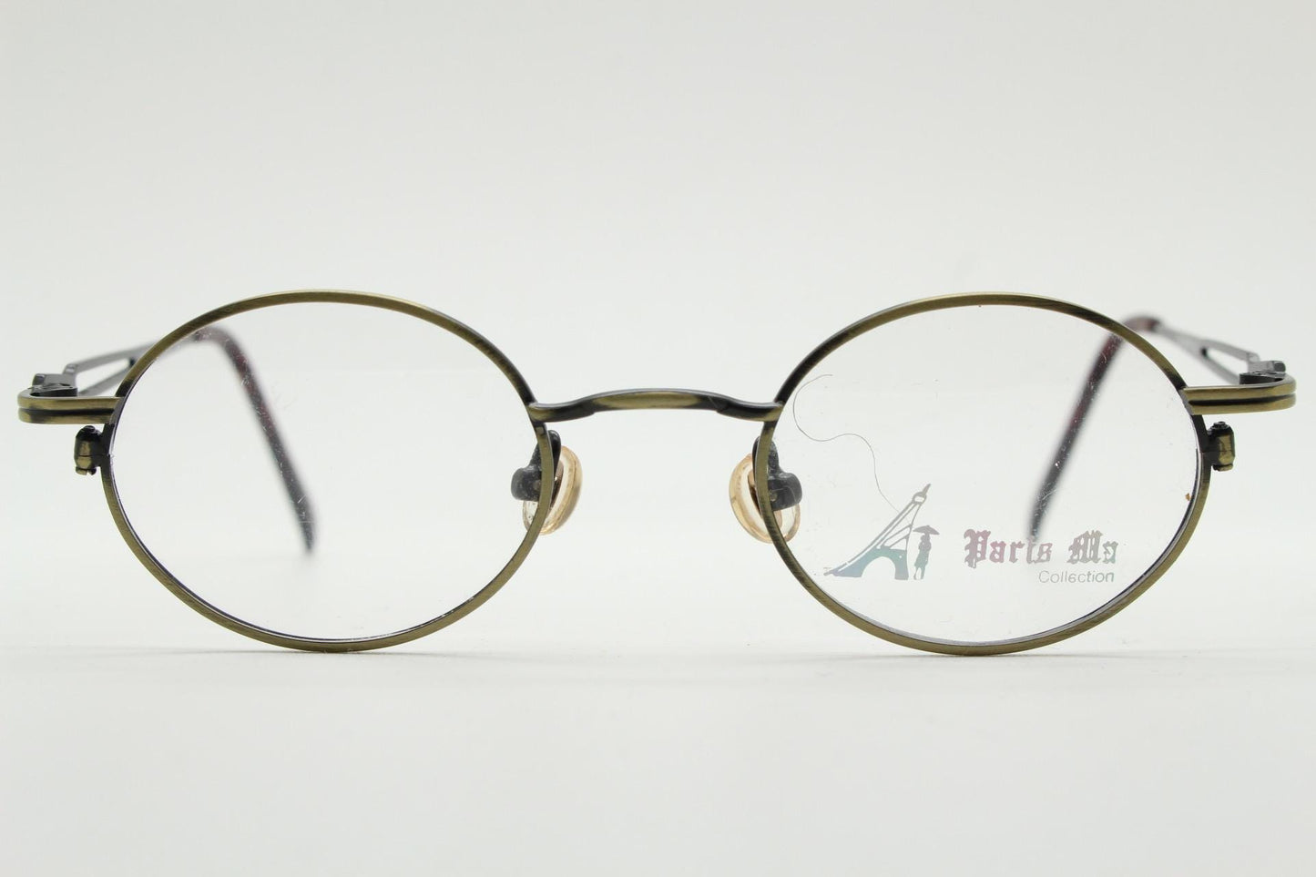 Paris Ma 90s vintage small oval eye glasses. Brushed bronze optical frames with charming details. Prescription NOS. Steampunk spectacles