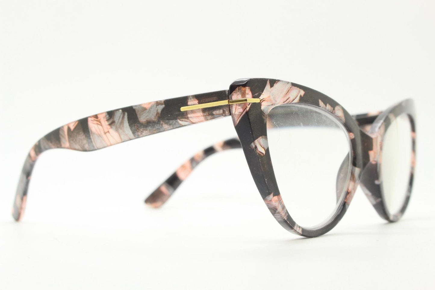 Dynamic pointed cat eye glasses. Transparent chunky cateye optical frame with pink and grey abstract pattern. Vintage Prescription RX