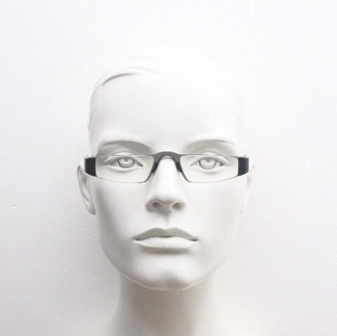 Porsche design rectangular eye glasses. Minimal grey metal optical frame in a matt finish with black arms. Vintage Prescription spectacles
