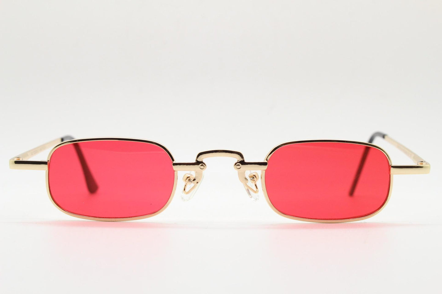 90s vintage small rectangular sunglasses. Imposing minimal gold metal victorian style frame with deep red lenses. Unused BNWT