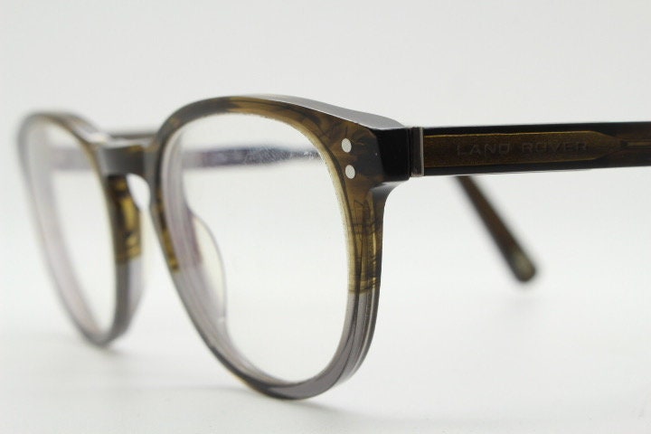 Land Rover vintage round 40s design eye glasses.Mottled brown and grey acetate optical frame with keyhole bridge. Prescription RX