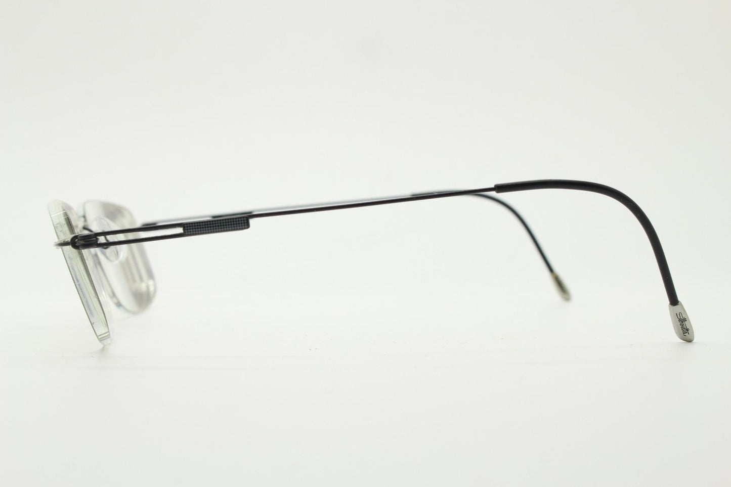 Silhouette rectangular frameless eye glasses made in Austria. Extremely minimal lightweight grey titanium optical frame. Prescription RX