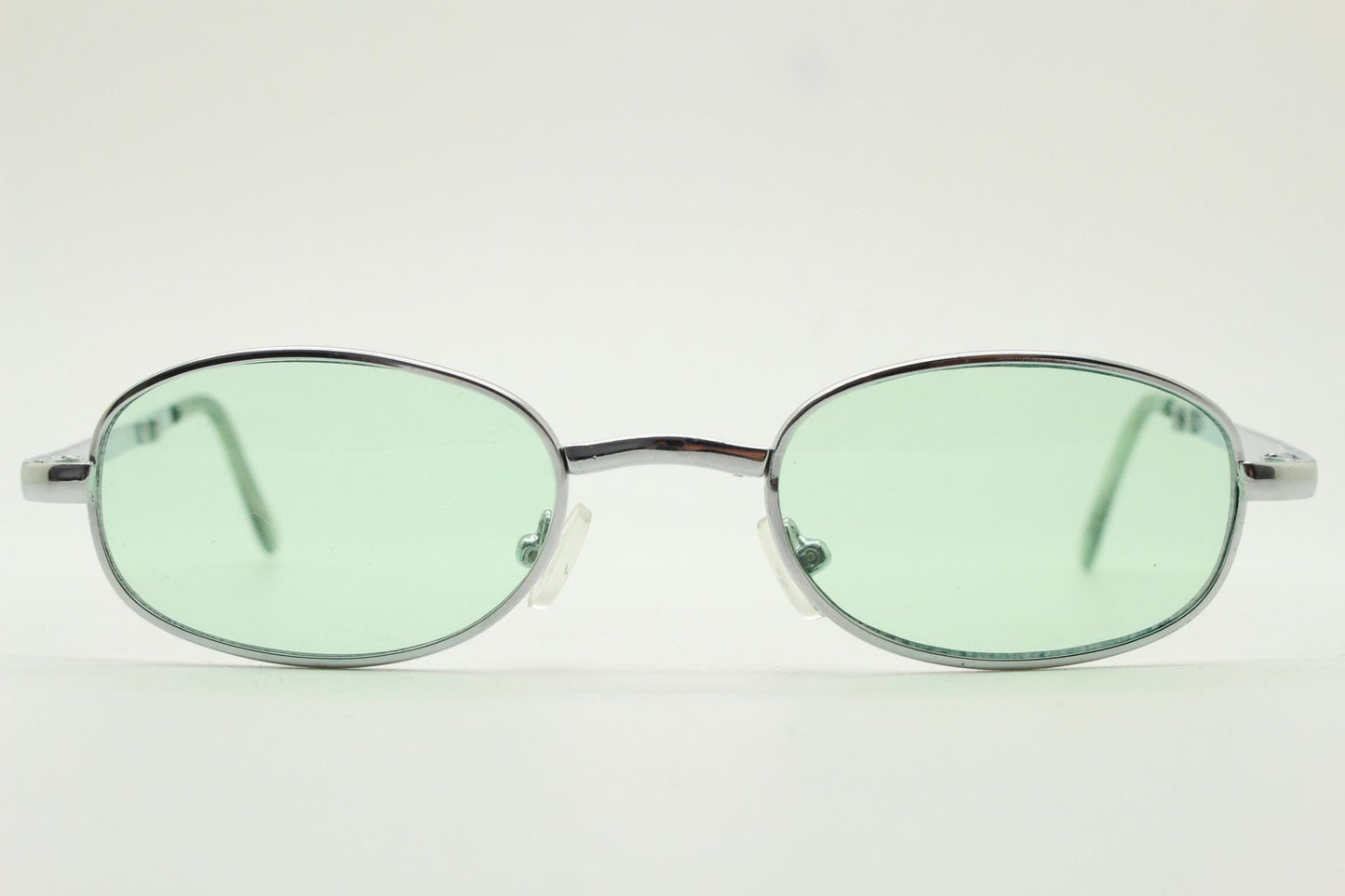 90s micro foldable oval sunglasses. Light green lenses in a small silver folding compact frame. Folder. Rave 2000s. Y2K. NOS