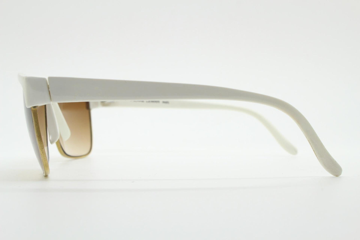 Pierre Leman Paris 80s vintage rectangular sunglasses made in France. Ice white flat top half frame with brown graduating lenses
