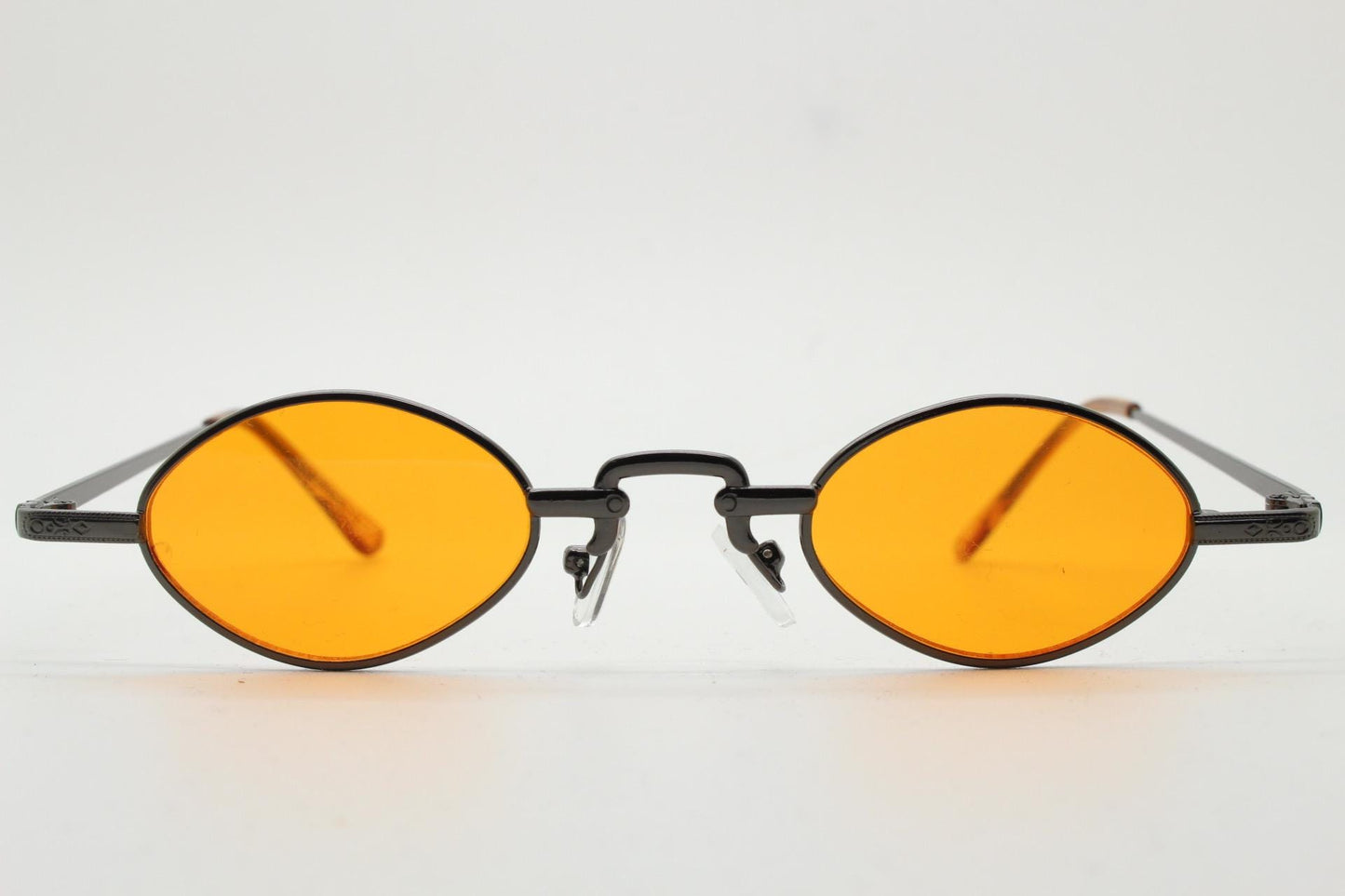 90s vintage small oval sunglasses. Imposing minimal rose gold metal victorian style frame with blazing orange lenses. Steampunk. BNWT