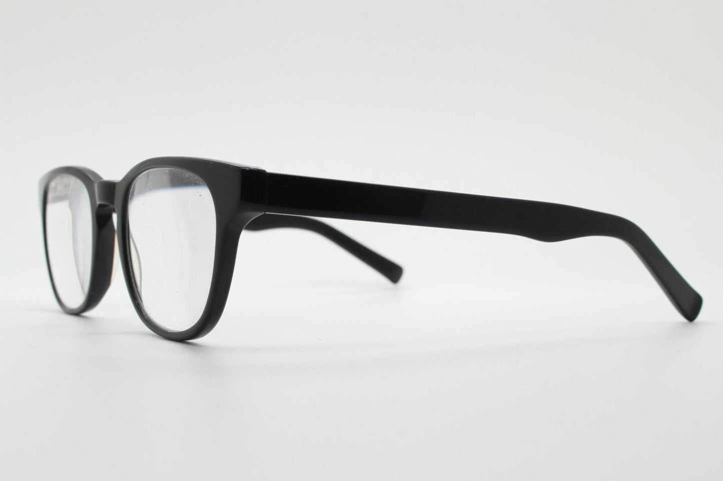 Andi Black rectangular horn rim eye glasses. Black gloss 40s design acetate optical frames with keyhole bridge. Prescription RX spectacles