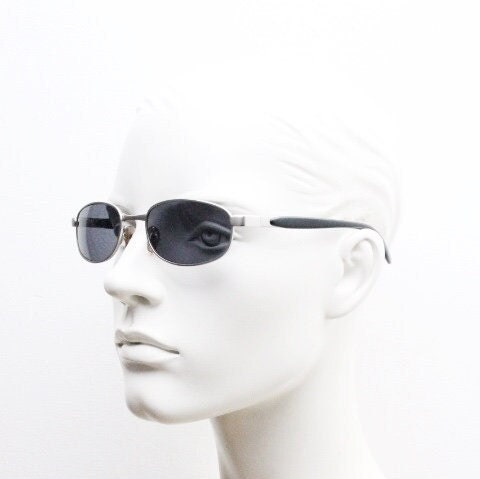 90s vintage small bug eye rectangular sunglasses. Satin finish silver frame with black gloss arms. Unused. 2000s. NOS