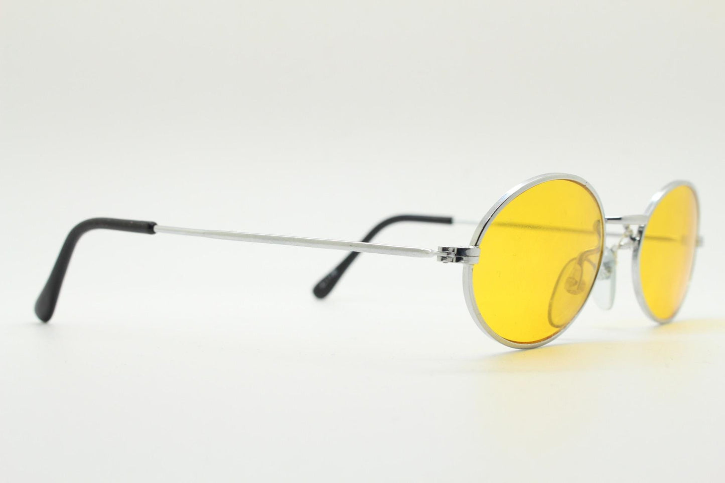 90s vintage small oval sunglasses. Minimal slender silver chrome metal frame with blazing orange lenses. Micro. Steampunk. Cosplay. NOS