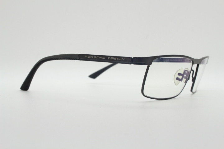 Porsche design rectangular eye glasses model 8251 made in Japan. Minimal gunmetal grey wire optical frame. Prescription RX spectacles