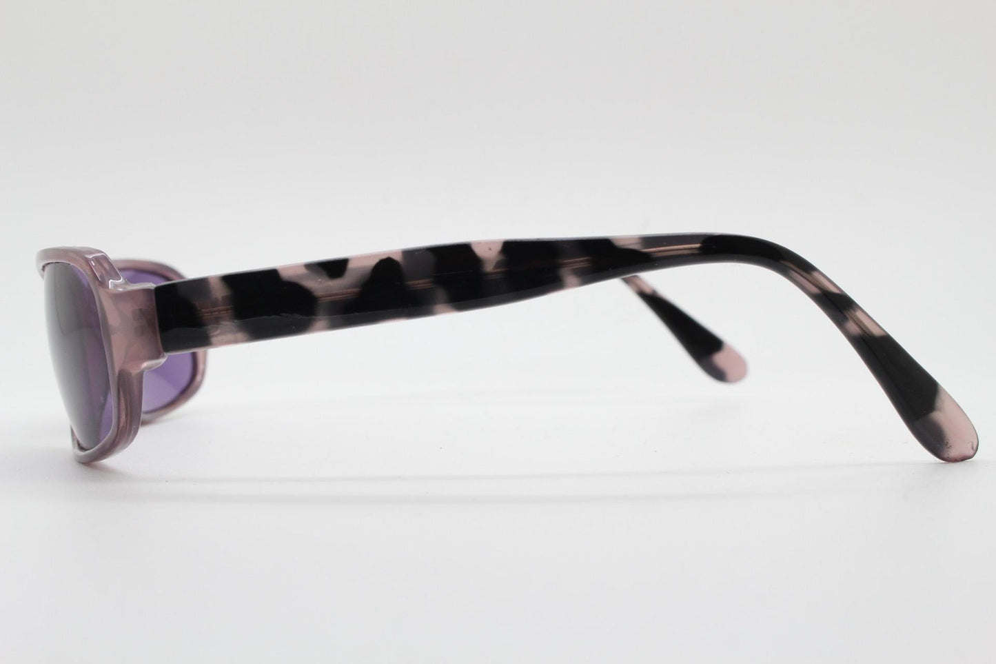 Y2k vintage wrap around sunglasses. Curved low profile frame with extraordinary purple turtle arms and well matched lenses. 2000's NOS