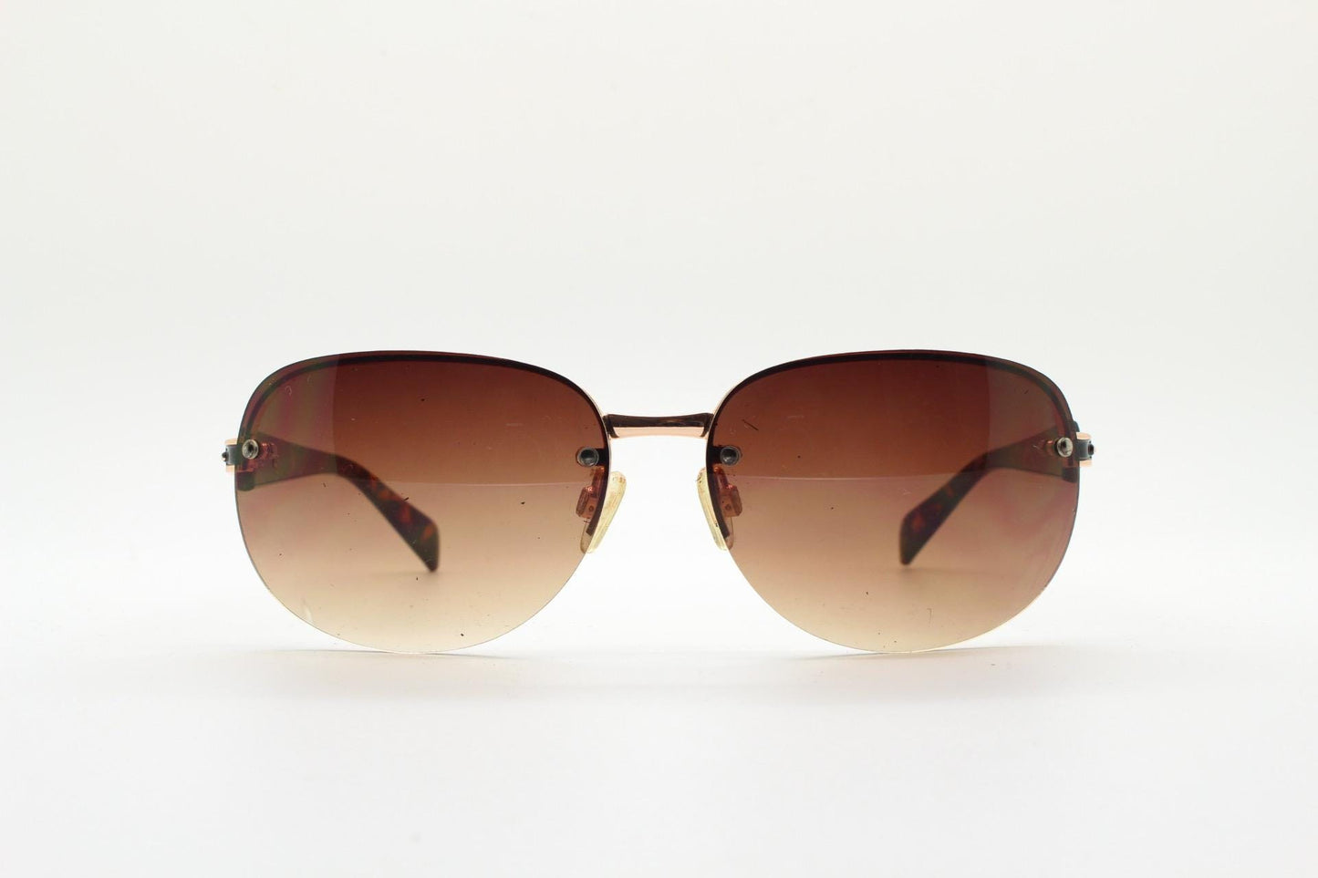 Y2K vintage rectangular brown sunglasses. Gold half frame with tortoise arms, chain link temples and graduating lenses. 2000's NOS