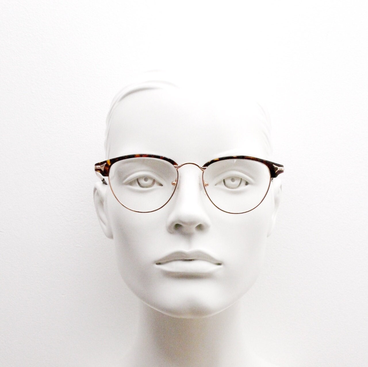 90s vintage browline cat eye glasses. Honey tortoise and gold half frame eyeglasses. 50s, 60s cateye design with clear lenses. NOS