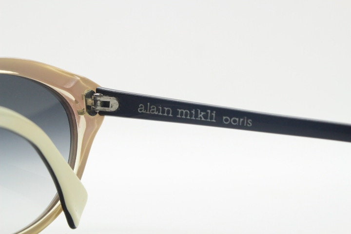 Alain Mikli Paris cat eye glasses made in France. Radical redefinition of the cateye optical frame. Womens prescription eyeglasses. RX